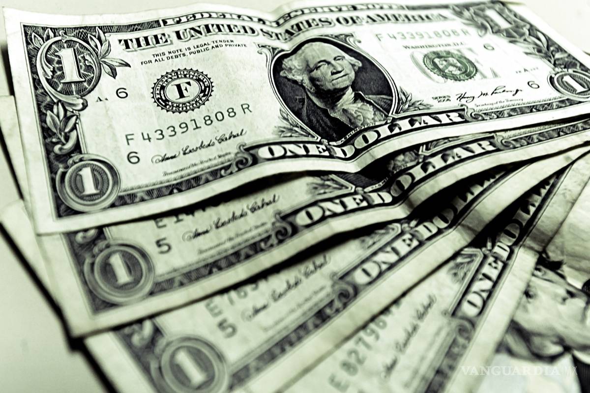 Eliminaría Cuba impuesto al dólar