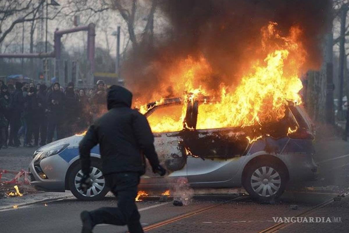 Draghi inaugura &quot;la nueva casa del euro&quot; entre violentos disturbios