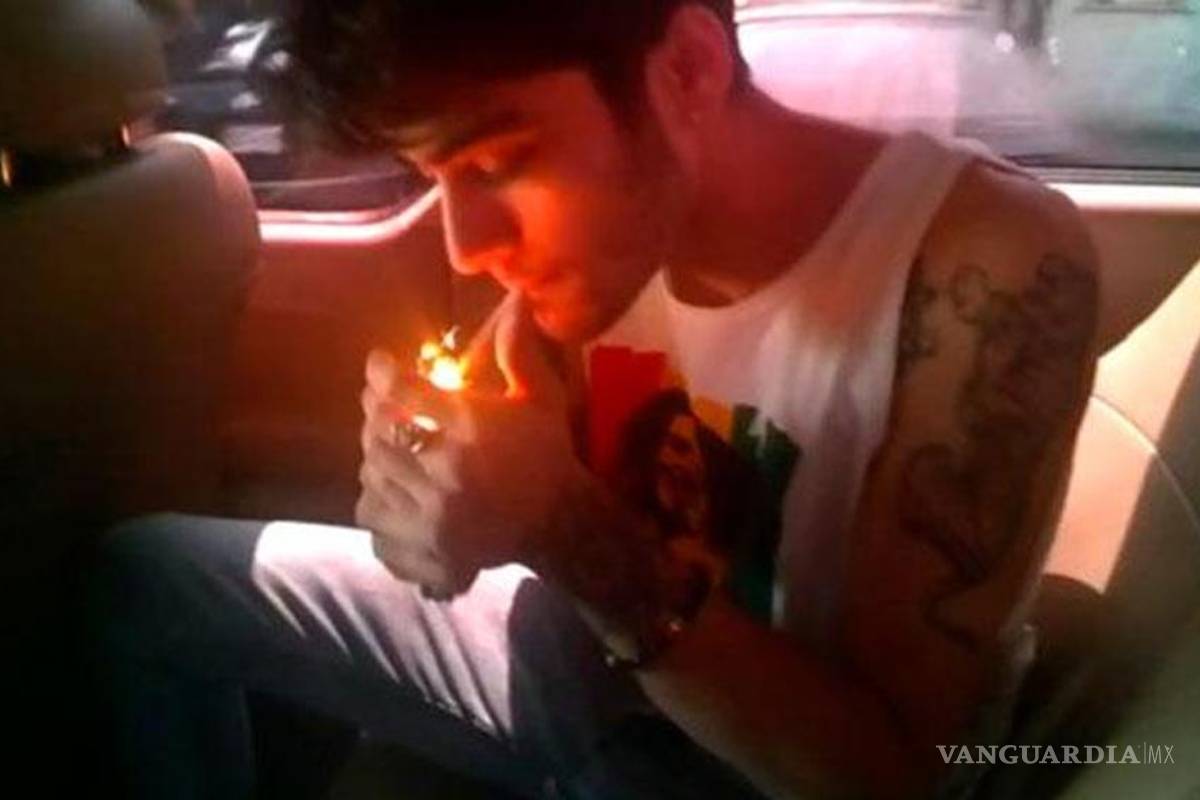 Captan a integrantes de One Direction fumando marihuana (video)