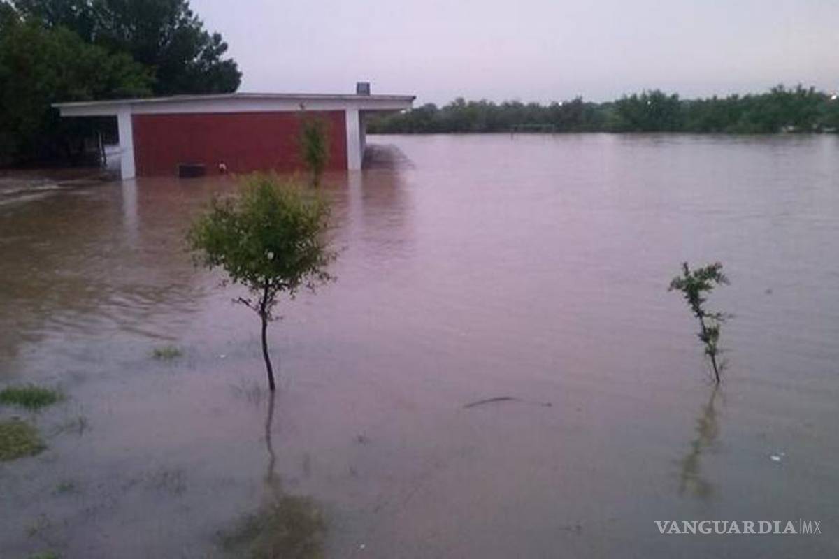 Lluvias provocan desbordamiento de arroyos y represas en Hidalgo, Coahuila