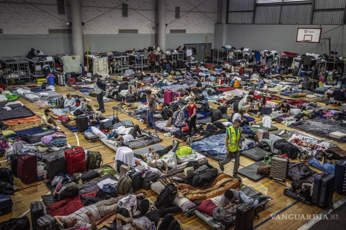 Acaba en Tijuana pesadilla de la guerra Rusia-Ucrania; migran a México con el sueño de llegar a EU