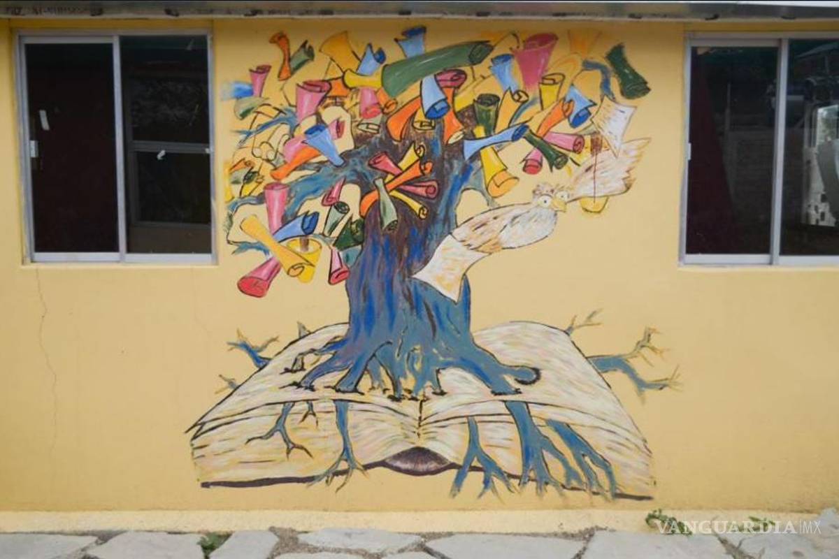 $!Un mural en el lateral de una biblioteca que S.A.C.R.E.D. ayudó a financiar y construir en Zaachila, Oaxaca.