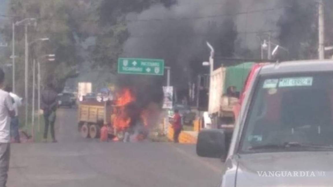 Con incendios y bloqueos impiden detención de criminal en Michoacán