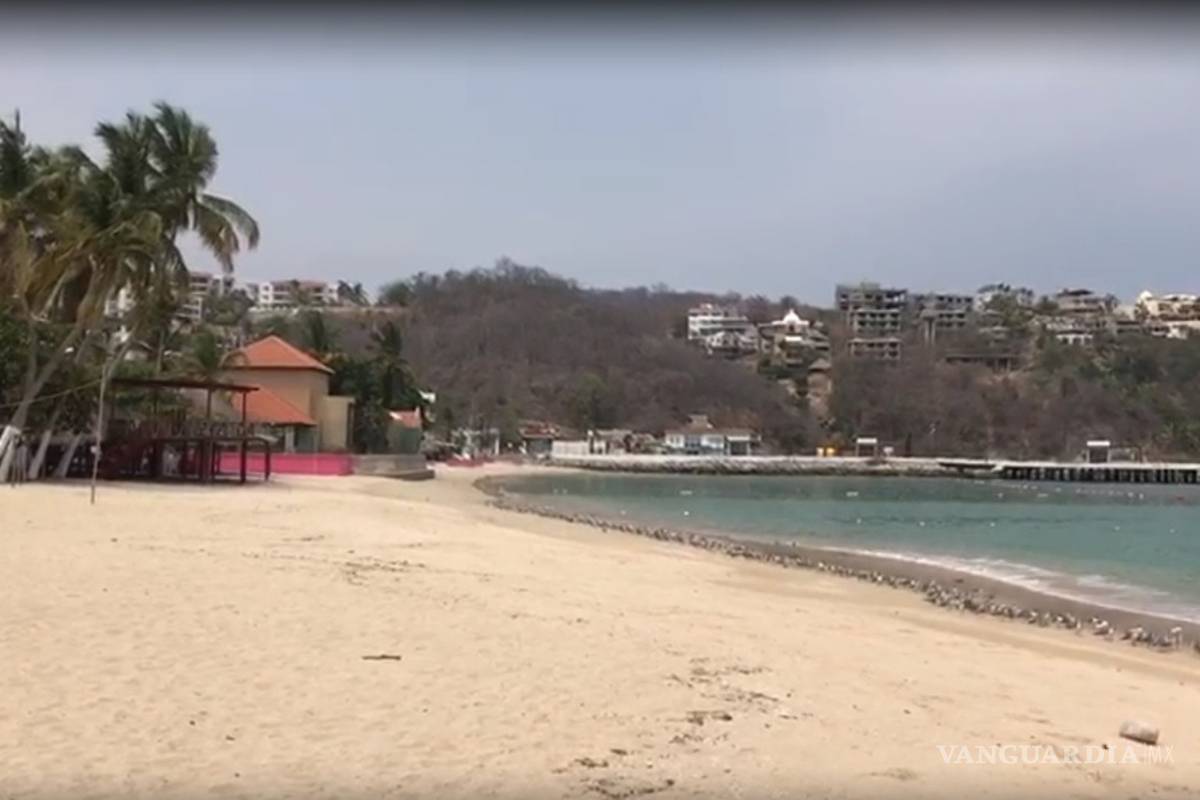 Pese a semáforo en rojo reabren playas en Oaxaca