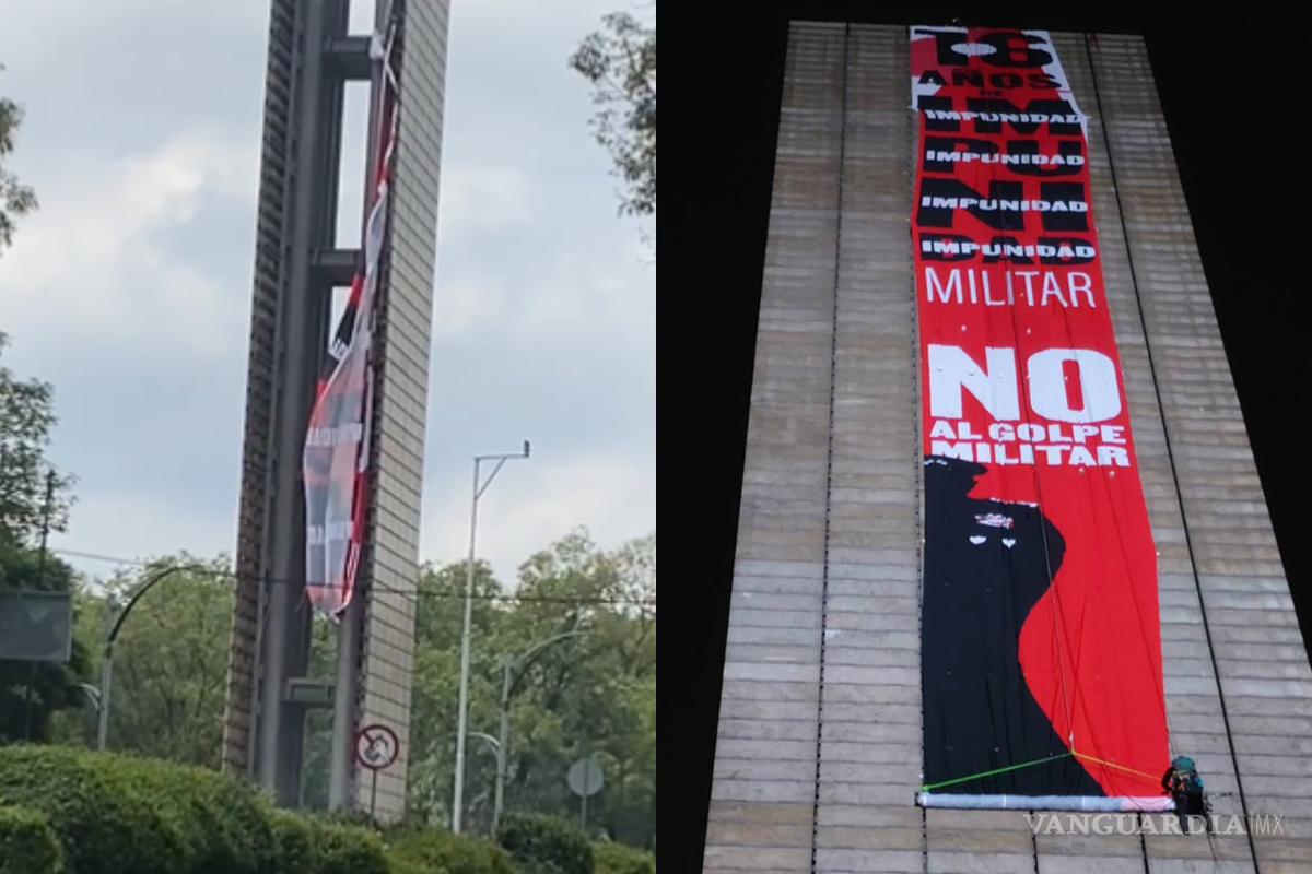 Durante desfile, retiran manta contra militarización en la ‘Estela de Luz’ de CDMX