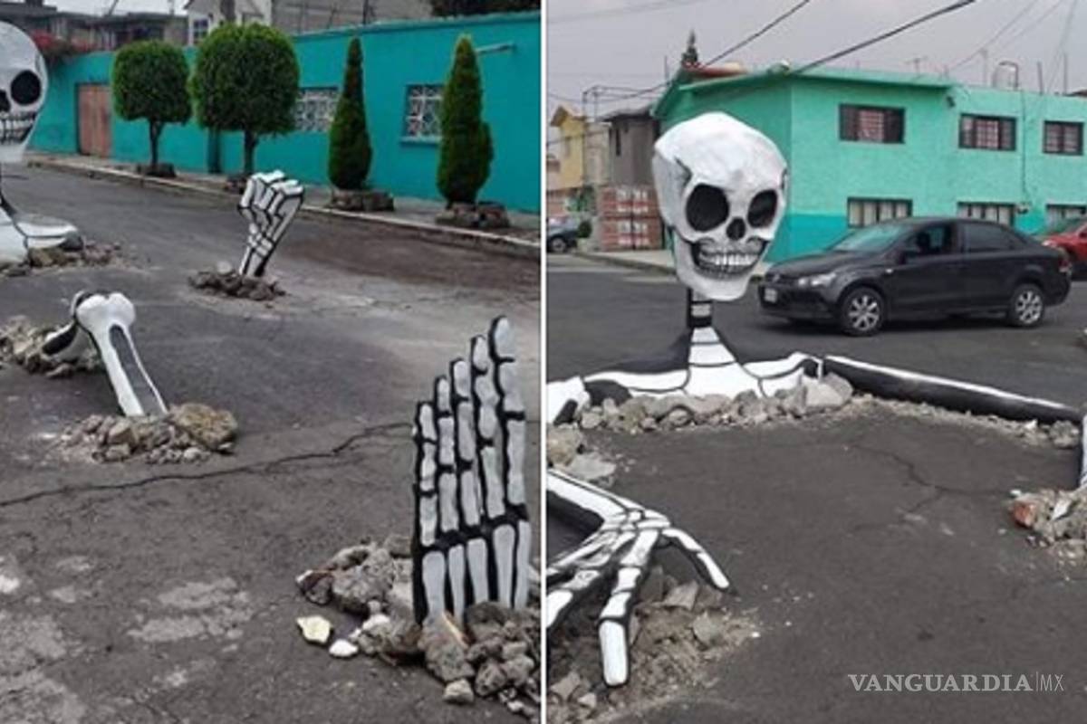 Aprovechan baches en calle de CDMX para colocar esqueletos gigantes y celebrar el Día de Muertos
