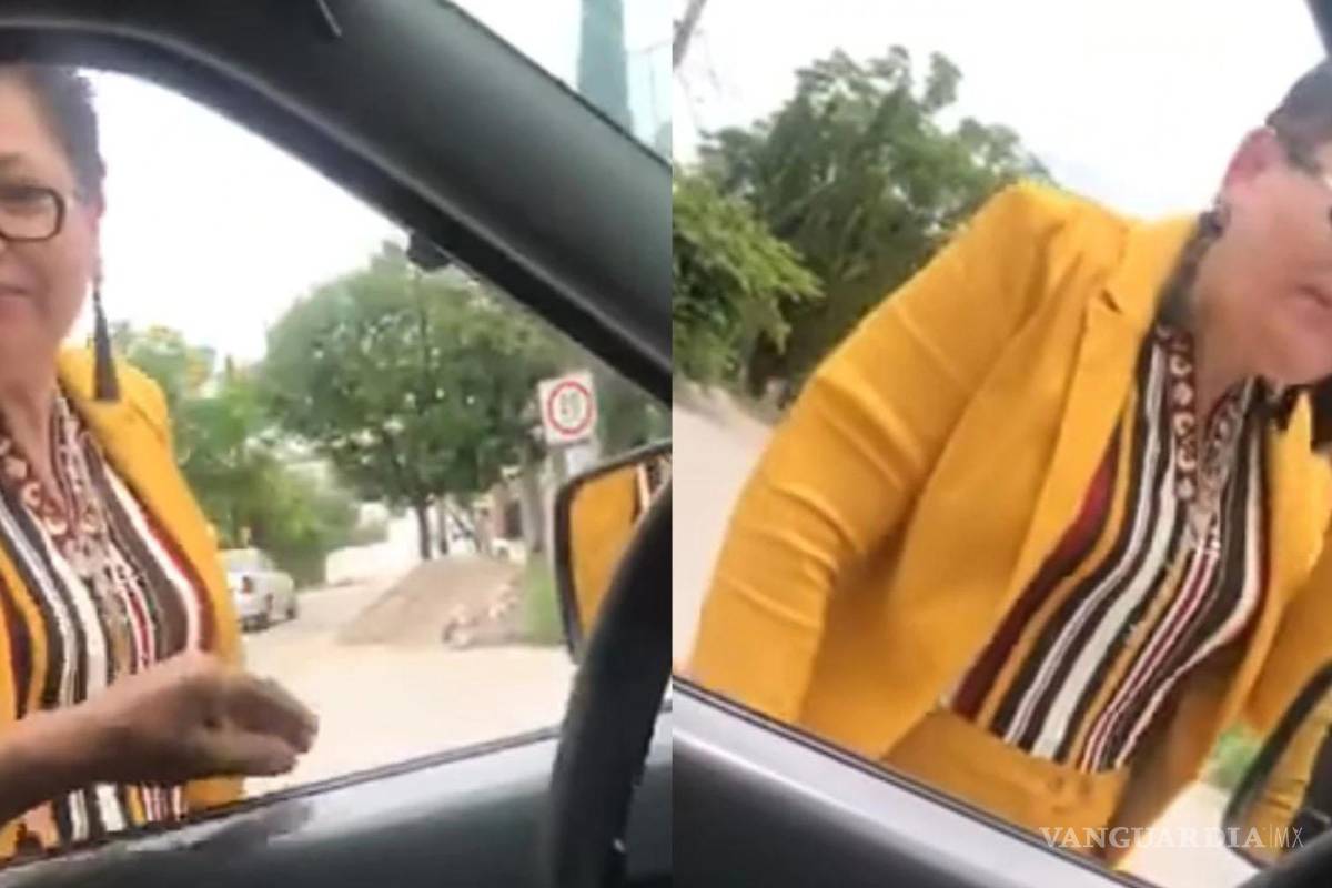 Lady Presidenta... mujer golpea auto con bate y amenaza a conductor (video)