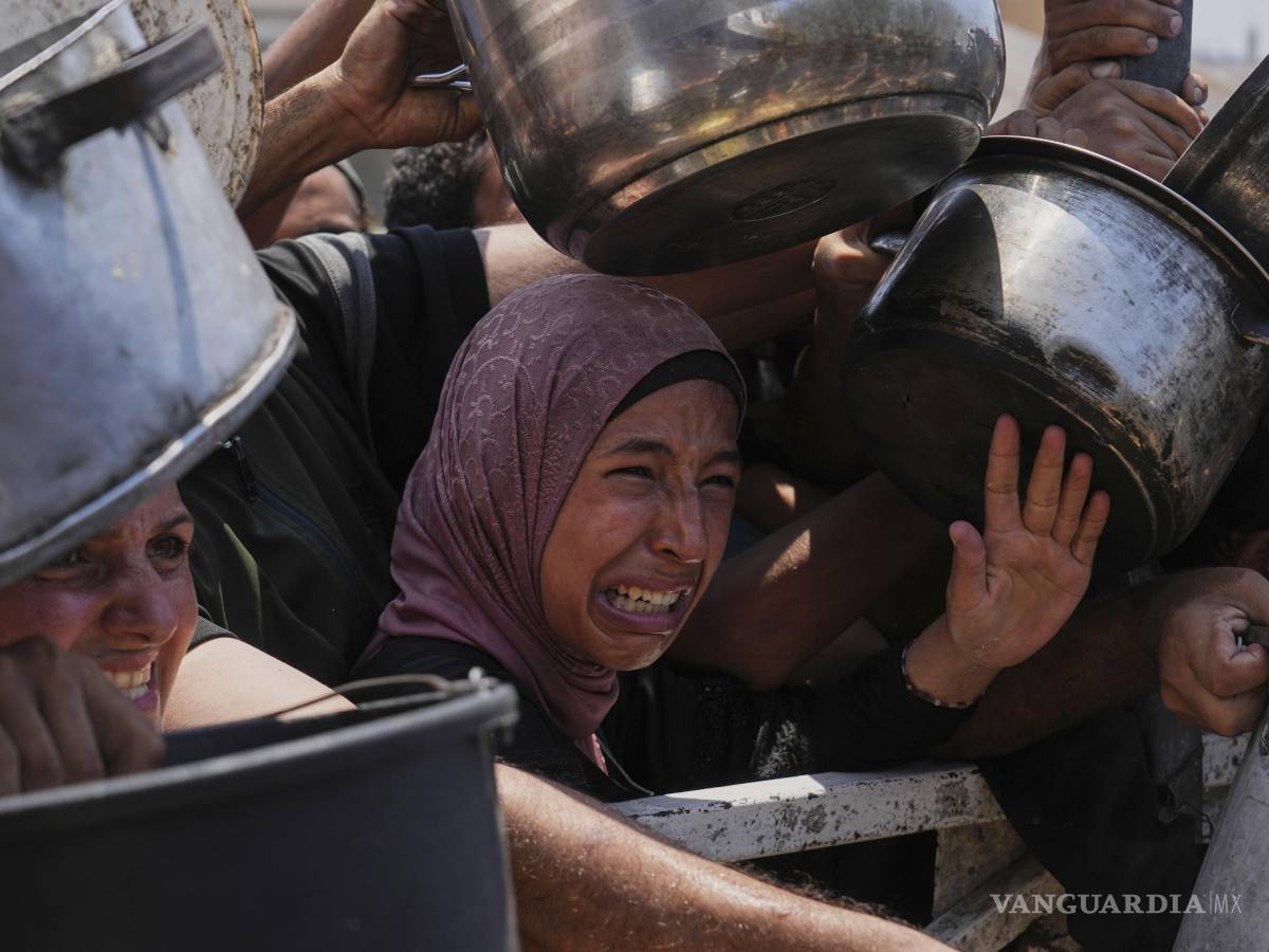 $!La distribución de alimentos sigue plagada de caos y violencia.