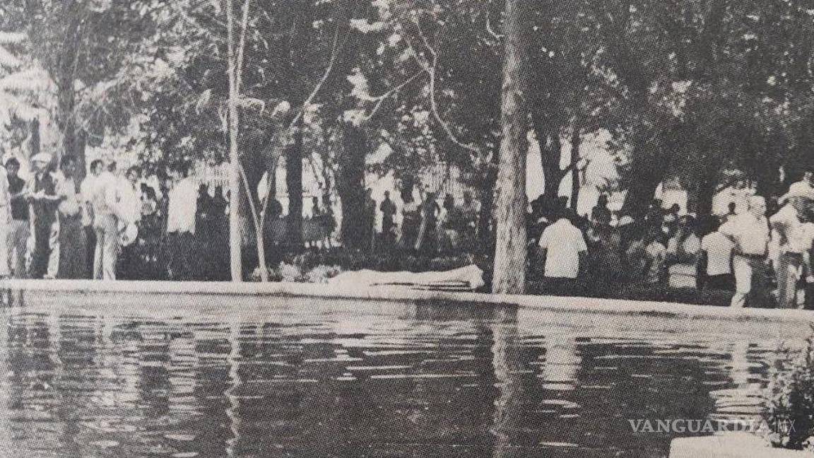 $!En la orilla del lago se aprecia el cuerpo de uno de los estudiantes fallecidos.