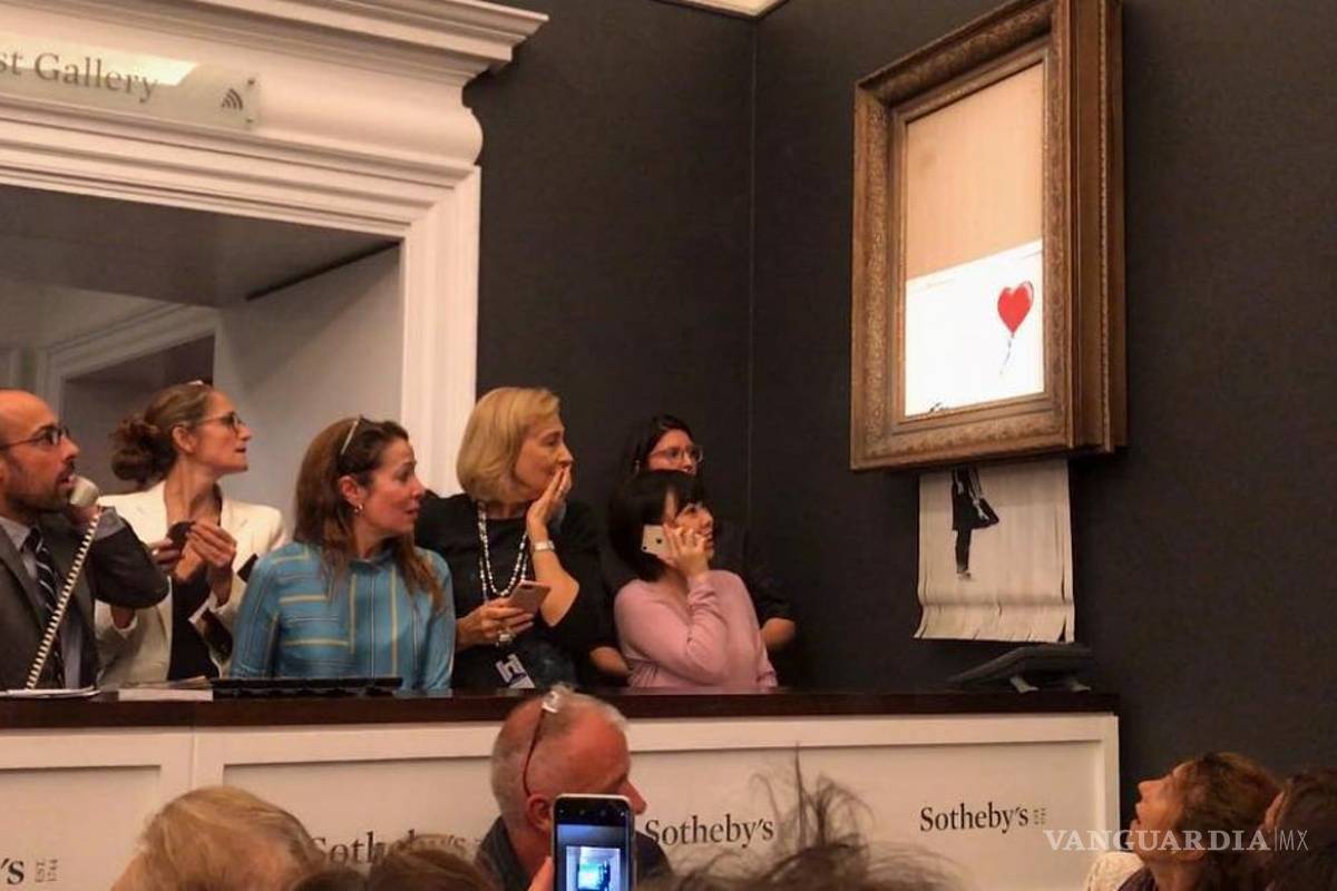 La última provocación de Banksy: obra se autodestruye tras venderse por 1.18 millones de euros en una subasta