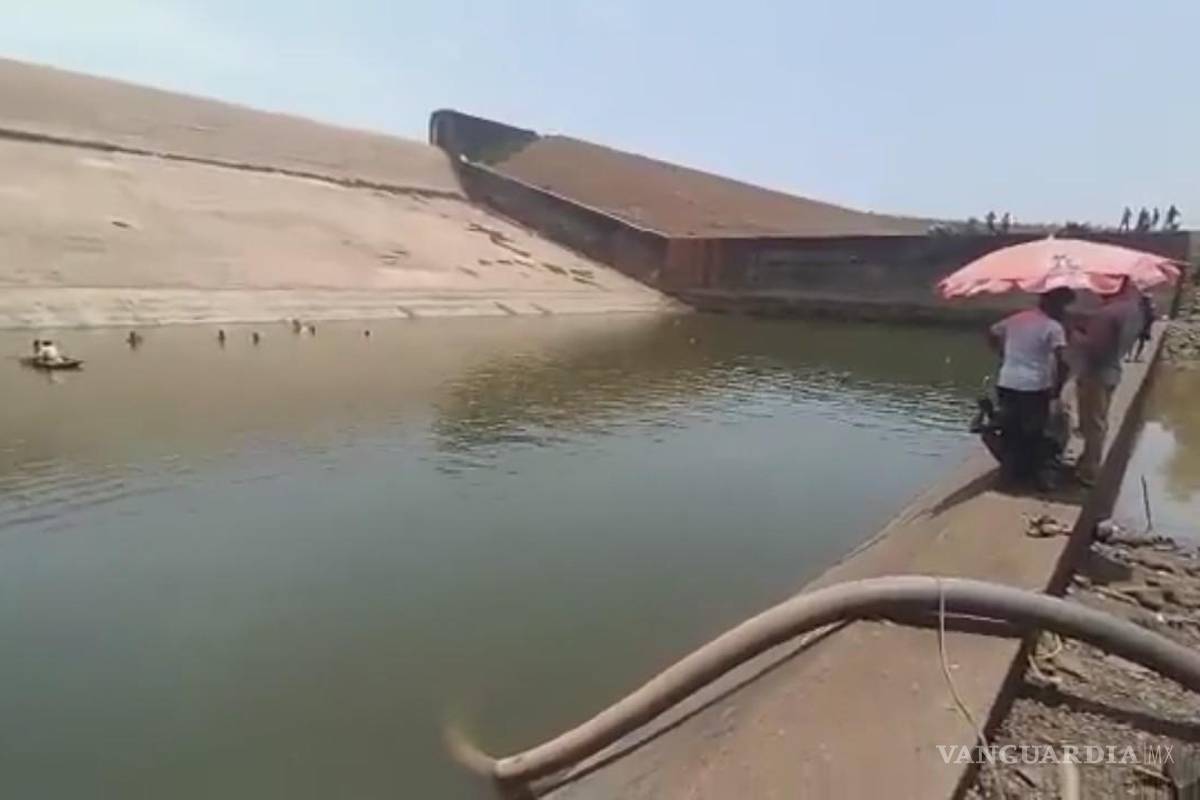 Un funcionario vació una represa para recuperar su celular que cayó al fondo, en la India