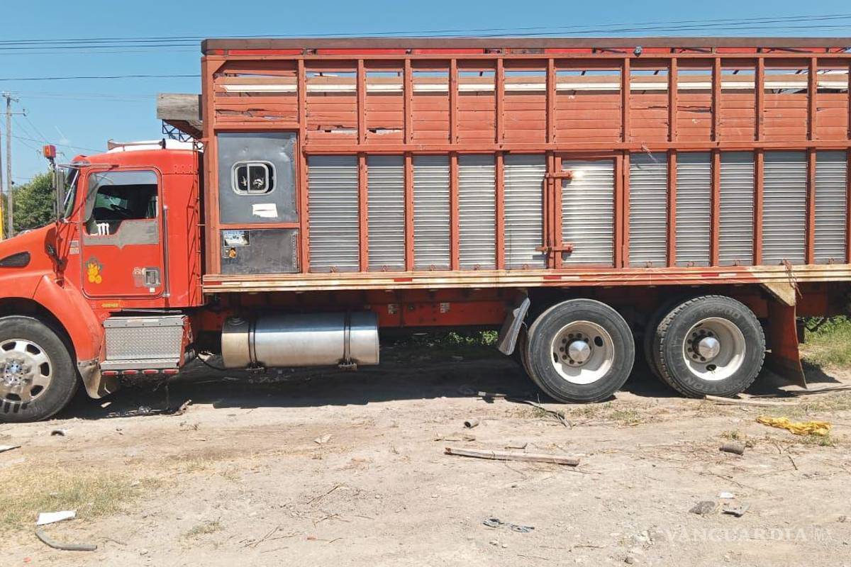 En Nuevo León detienen a dos hombres con más de medio millón de pesos oculto en tractocamión