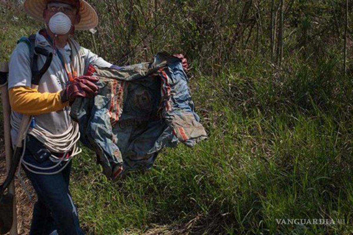 Hay hasta ropa de bebé entre prendas de cuerpos hallados en fosa de Veracruz