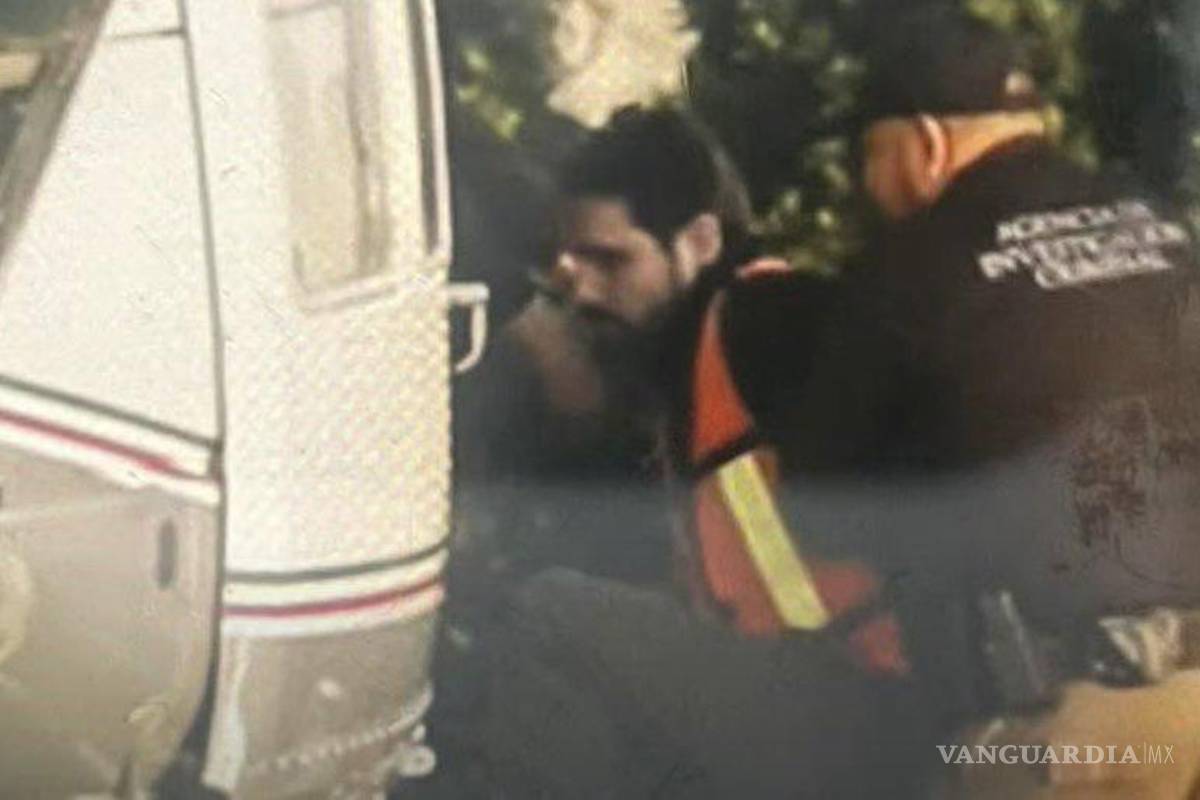 $!Se dio a conocer la primera imagen de la detención del hijo de Joaquín “El Chapo” Guzmán, Ovidio Guzmán, mientras sube al helicóptero de las Fuerzas Armadas.