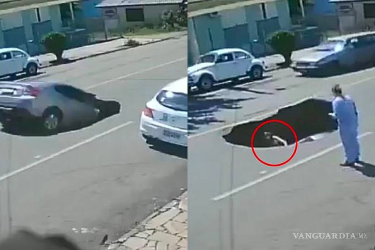 Cae conductora en socavón recién formado por un camión de carga (VIDEO)