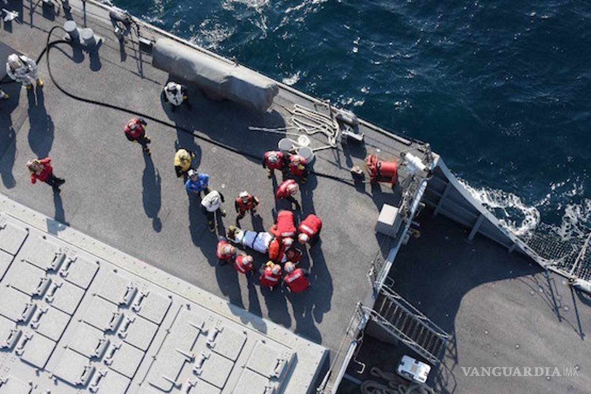 Rescatan los cuerpos de 7 soldados desaparecidos tras el choque entre destructor de EU y carguero