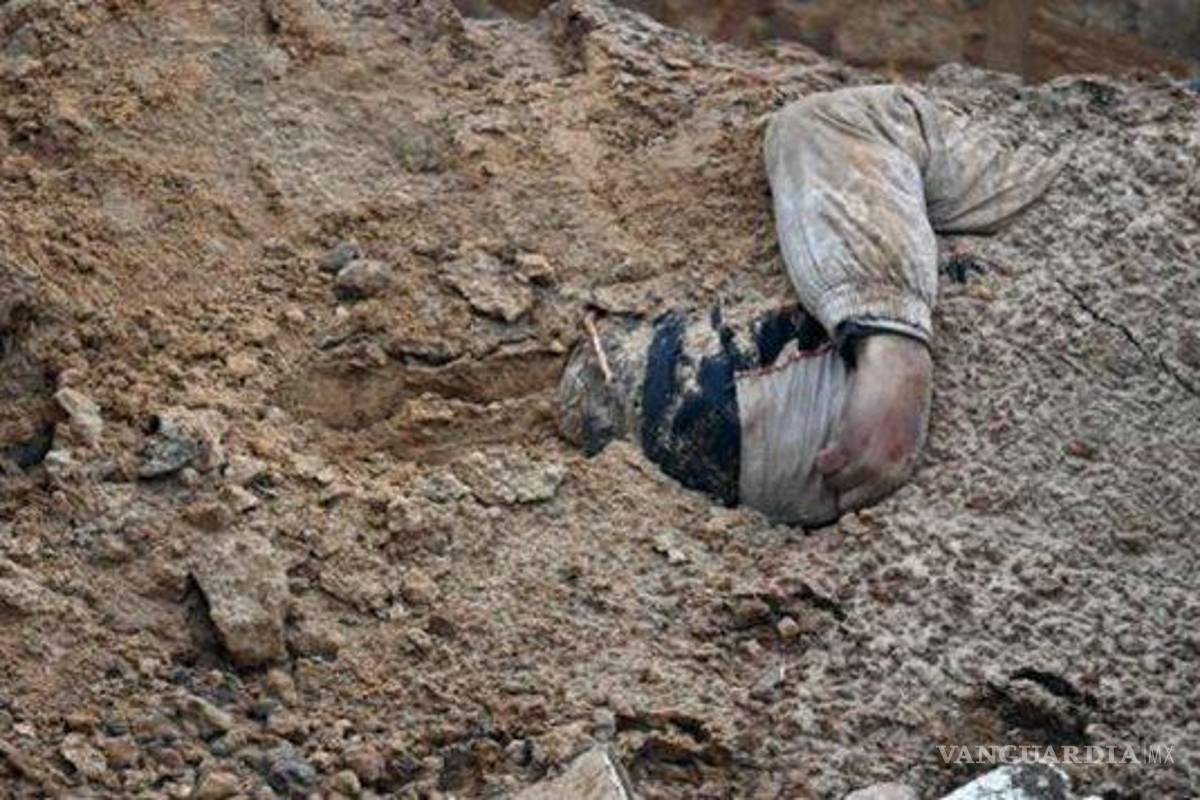 Otra masacre en Ucrania, hallan fosa común con cadáveres de civiles en Buzova, a las afueras de Kiev