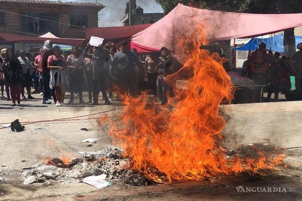 Pobladores de Morelos hacen nuevo recorrido contra consulta por termoeléctrica; queman una urna
