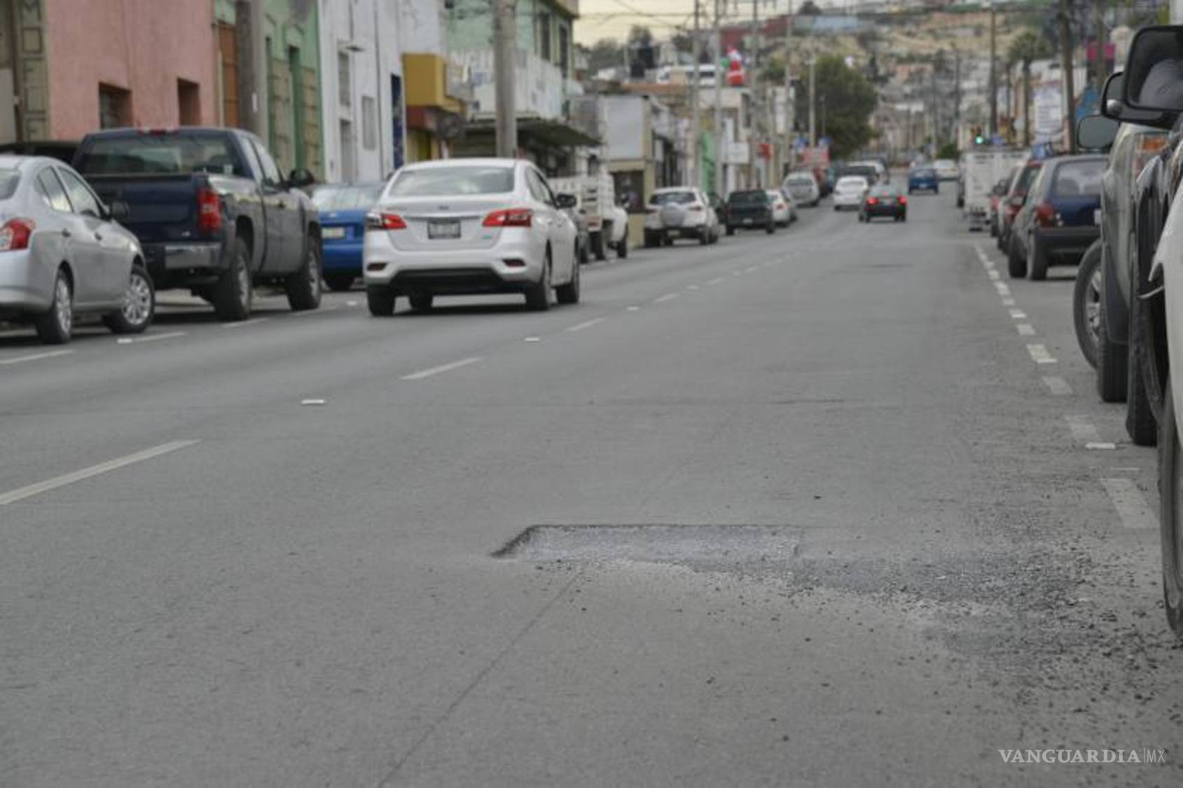 $!Tramo de la calle Mariano Matamoros, entre Valdés Sánchez y Juárez, muestra deterioro a pesar de las recientes obras de repavimentación.