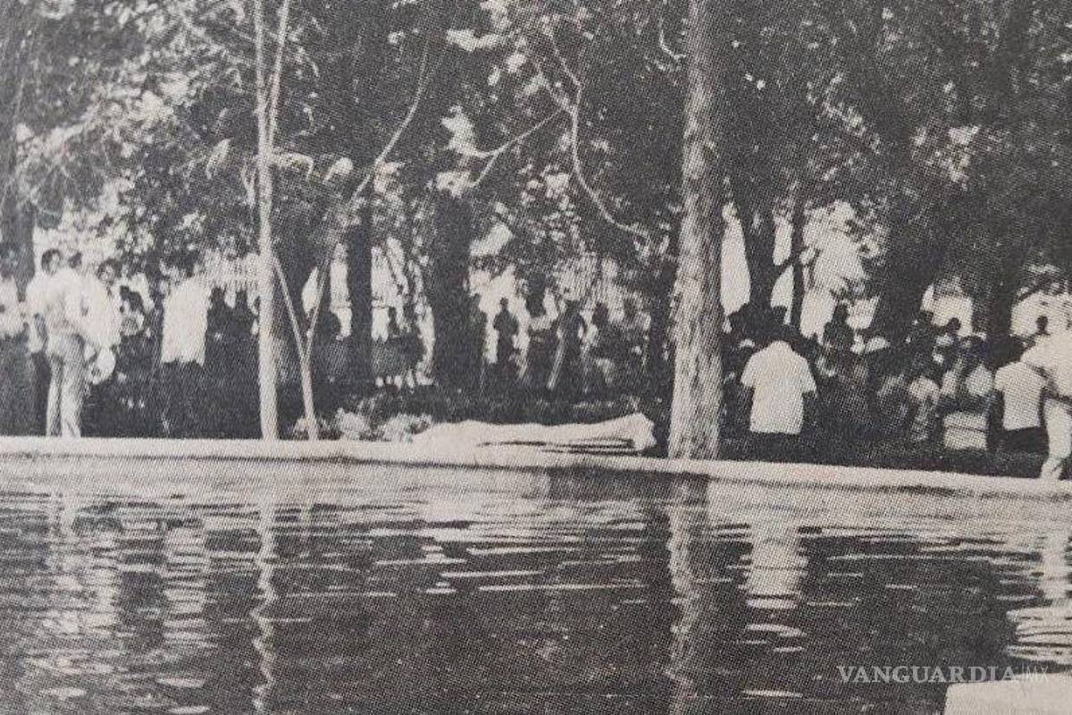 $!En la orilla del lago se aprecia el cuerpo de uno de los estudiantes fallecidos.