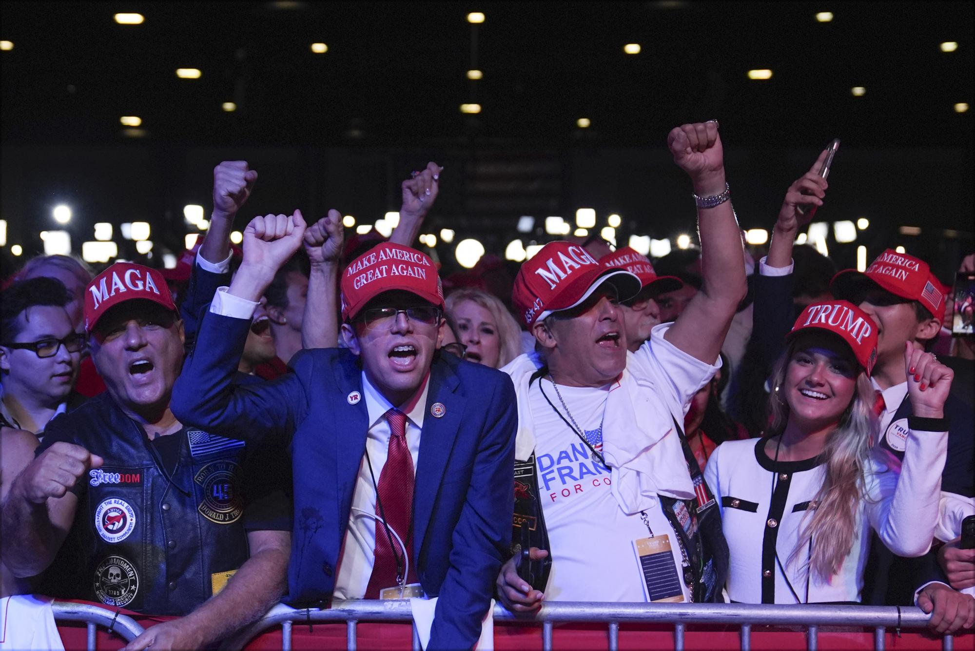 $!Supporters arrive at an election night watch party for Republican presidential nominee former President Donald Trump Tuesday, Nov. 5, 2024, in West Palm Beach, Fla. (AP Photo/Evan Vucci)