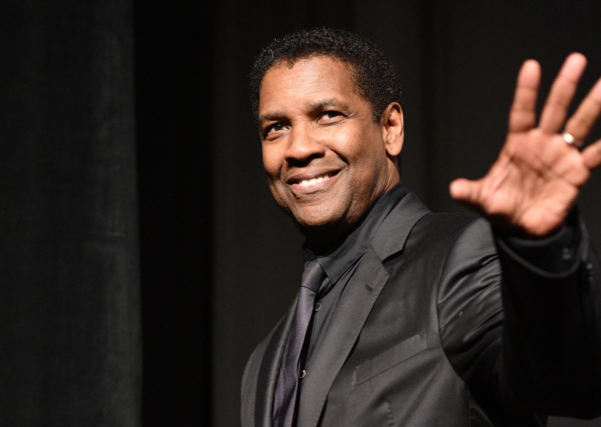 $!TORONTO, ON - SEPTEMBER 08: Actor Denzel Washington speaks onstage at The Magnificent Seven premiere during the 2016 Toronto International Film Festival at Roy Thomson Hall on September 8, 2016 in Toronto, Canada. (Photo by George Pimentel/WireImage)