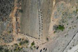 Huellas petrificadas de dinosaurios son visibles en Carreras Pampa, en el Parque Nacional Toro Toro, al norte de Potosí, Bolivia, el sábado 6 de diciembre de 2025.