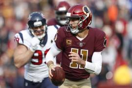 El QB de los Redskins tendría una infección post cirugía y aún no regresará a la NFL