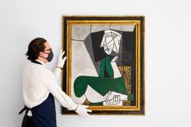 &quot;Femme assise en costume vert&quot; de Picasso saldrá a subasta por primera vez en 35 años