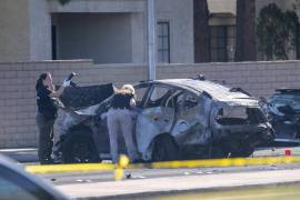 Investigadores de la policía de Las Vegas en el sitio de un accidente que dejó una persona muerte y en la que el jugador conducía intoxicado.