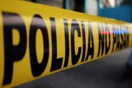 Una intensa movilización se registró este viernes en calles del centro de Monterrey ante el hallazgo del cuerpo de un hombre en un bote de basura.