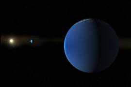 Esta ilustración proporcionada por la NASA muestra la estrella TOI-791, similar al Sol, al fondo a la izquierda, y dos planetas gigantes que el telescopio espacial TESS de la NASA descubrió en su órbita.