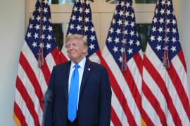 El presidente Donald Trump asiste a un acto con legisladores republicanos en el Jardín de las Rosas de la Casa Blanca en Washington.