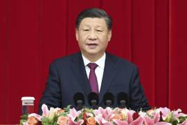 En esta foto distribuida por la agencia noticiosa Xinhua, el presidente chino Xi Jinping habla ante el Comité Nacional de la Conferencia Consultiva Política del Pueblo Chino en Beijing, 30 de diciembre de 2022.