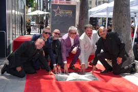 Orgullo. Ricky Muñoz y los integrantes de Intocable celebraron el reconocimiento acompañados por amigos y figuras de la industria musical.