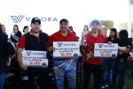 Antonio José, Daniel González Acevez y Octavio Valdés recibieron sus trofeos como Campeones de la Décimo Primera edición del Torneo de Golf del Banco de Alimentos.