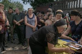 Exigencia. Luego de meses de la irrupción rusa en territorio ucraniano, los habitantes exigen justicia por actos que señalan como crímenes de guerra.