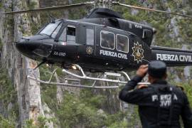 Protección Civil de Nuevo León logró la localización del cuerpo de una mujer quien habría sido arrastrada por la corriente en la comunidad el Barco, en Cadereyta Jiménez, Nuevo León / FOTO: CUARTOSCURO.