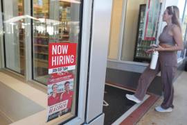 A for hire sign is displayed at a GNC store Friday, Jan. 9, 2026, in Miami Beach, Fla. (AP Photo/Marta Lavandier)