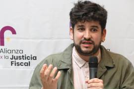 El coordinador de estrategia de justicia fiscal en Oxfam México, Diego Merla, habla durante una rueda de prensa en Ciudad de México.
