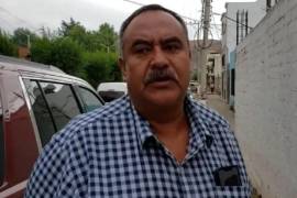 El cuerpo del exedil fue localizado presuntamente envuelto y con signos de violencia a un costado de la carretera federal 54.