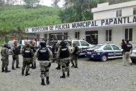 Suman 8 policías de Papantla detenidos por desaparición de 3 jóvenes