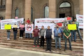 El colectivo, representado por Cristina Marmolejo, denunció multas superiores a los 45 mil pesos y acoso a usuarios por parte de agentes federales.