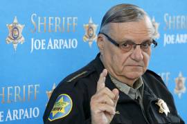 FILE - In this Dec. 18, 2013, file photo, Maricopa County Sheriff Joe Arpaio pauses as he answers a question at a news conference at Maricopa County Sheriff's Office Headquarters in Phoenix. Nearly five years after Arpaio was voted out as sheriff of Arizona's most populous county, taxpayers are covering one of the last major bills from the thousands of lawsuits the lawman's headline-grabbing tactics inspired. (AP Photo/Ross D. Franklin, File)