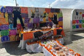 En el altar se colocaron los uniformes, objetos personales y comida preferida de Valeria y Dominick.