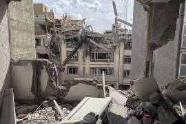 Edificios residenciales destruidos tras los ataques aéreos estadounidenses e israelíes en Teherán, Irán, el 27 de marzo de 2026.