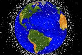 Una ilustración que muestra la basura espacial que rodea al planeta Tierra y que está formada por los satélites o cohetes fuera de uso.