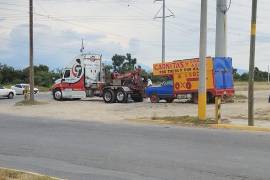 La cabeza humana estaba en el cofre de una camioneta en donde se anuncia la venta de carnitas, en Pesquería, Nuevo León/FOTO: CORTESÍA