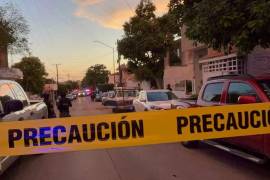 Autoridades resguardaron la escena del doble homicidio y dieron aviso a la Fiscalía General del Estado.