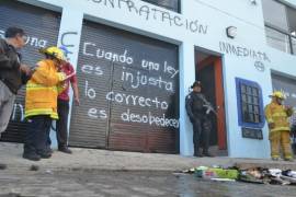 Normalistas vandalizan sede alterna del IEEPO